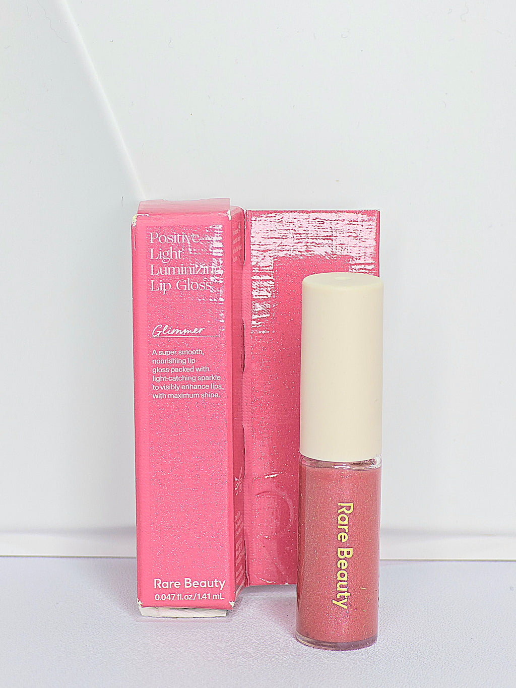 Rare Beauty Positive Light Luminizing Lip Gloss in Glimmer